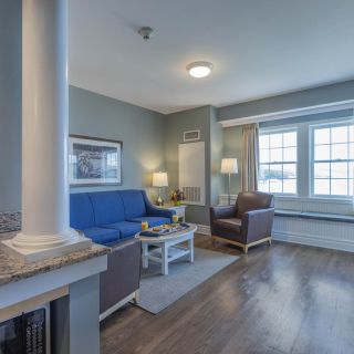 The living room in a Lake View Suite at the Watkins Glen Harbor Hotel