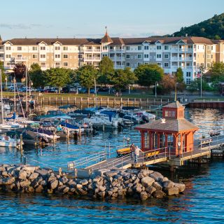 An aerial view of the marina in Watkins Glen harbor, with the Harbor Hotel in the background