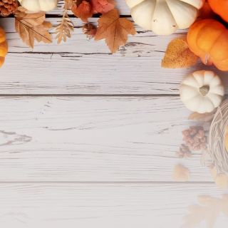 Image of various gourds on a table with the overlay text Thanksgiving - Celebrate With Us